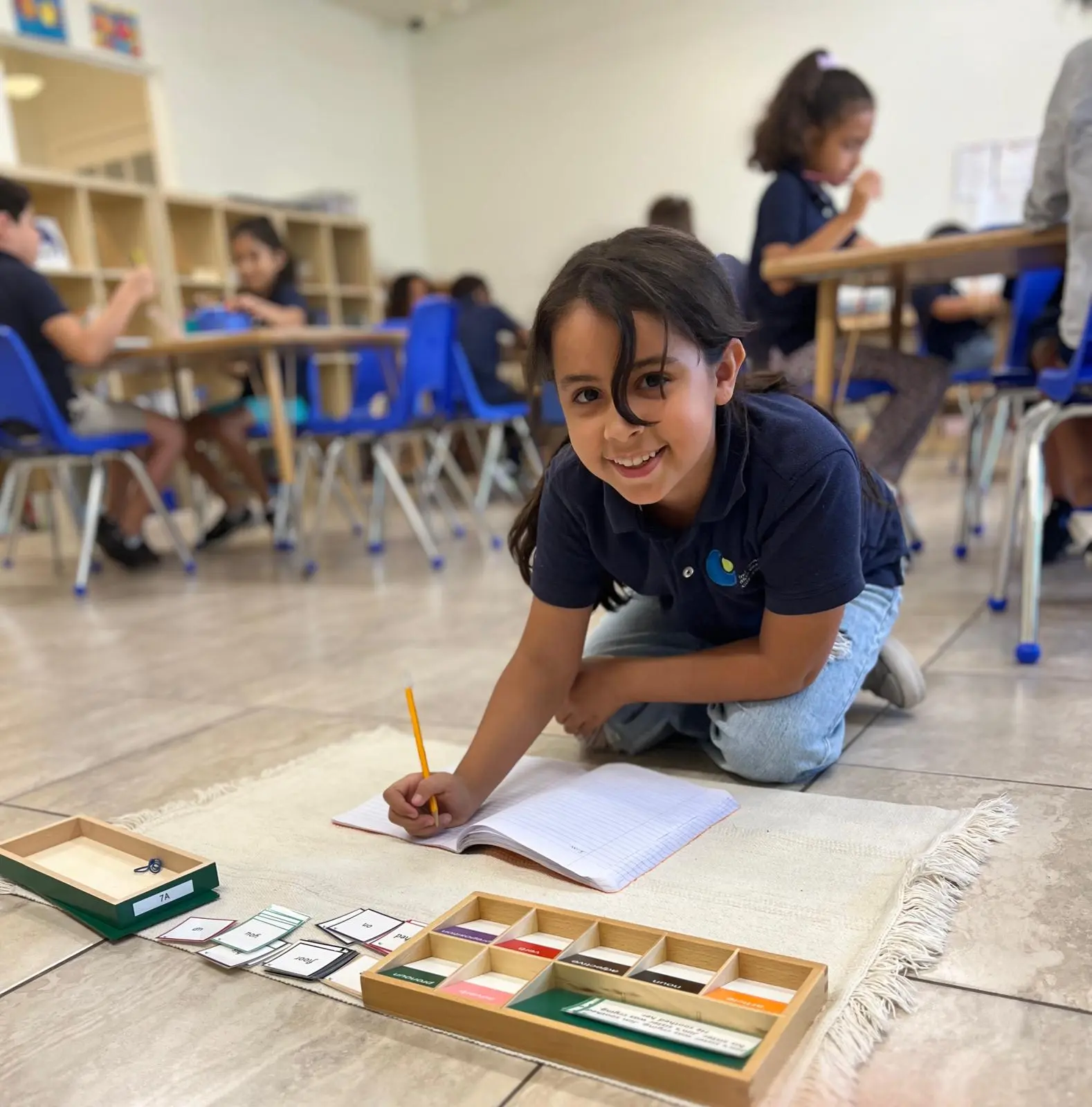 happy student in Montessori class